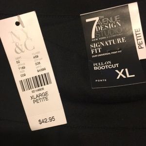 New York & Company pull on boot cut pants.